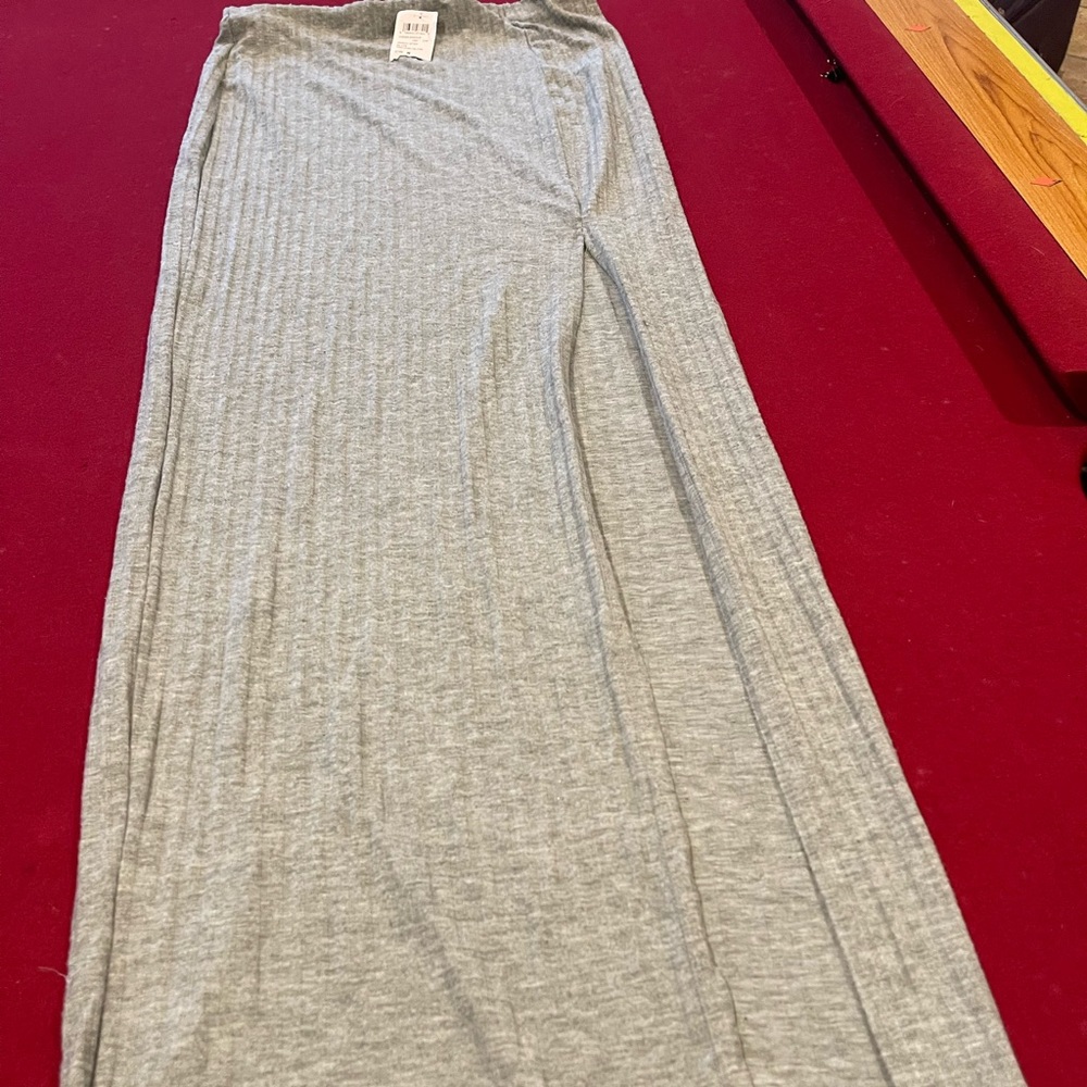 Long grey skirt.